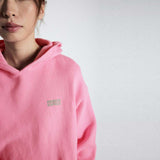 Pink hoodie med grøn logo fra American Vintage