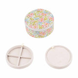 rundt blomstret lyserødt smykkeskrin