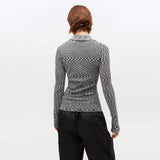 GANNI K2606 Spacedyed Polo - sort