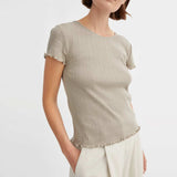 pige grøn kortærmet t-shirt med hulmønster