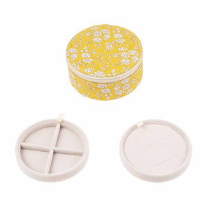 rundt blomstret gult smykkeskrin 